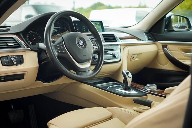 BMW 4-SERIE Coupé 430i High Executive / Leder / Navi Prof