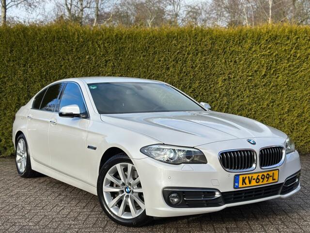 BMW 5-SERIE 520i sedan High Executive Luxury Line Navigatie professional C