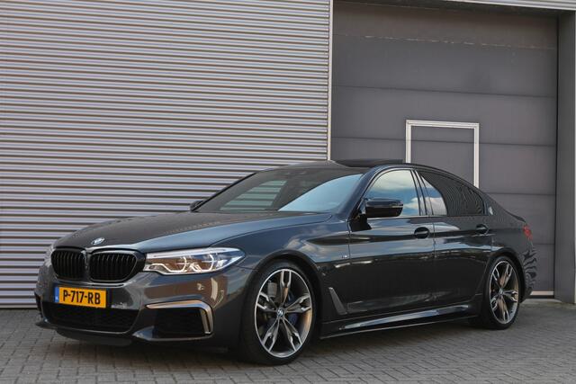 BMW 5-SERIE M550i xDrive High Executive I AUT. I 463 PK I LEDER I SCHUIFDAK I CARPLAY