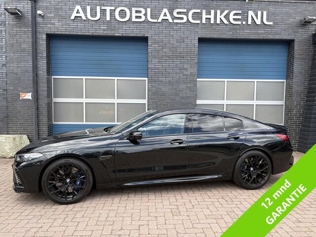 BMW M8 8-serie Gran Coupé Competition, all black.