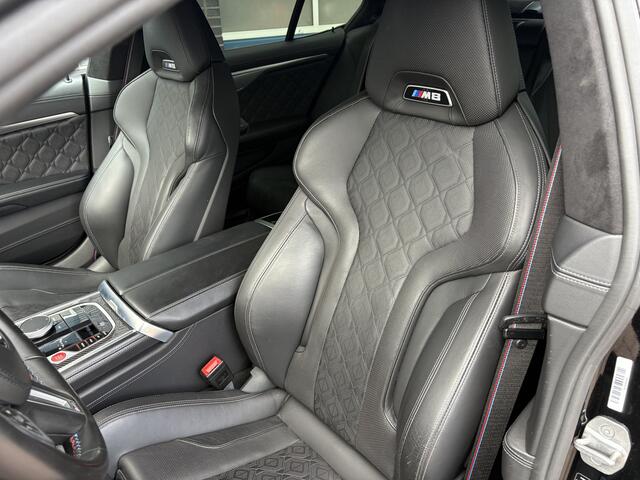 BMW M8 8-serie Gran Coupé Competition, all black.