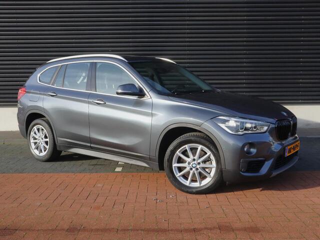 BMW X1 sDrive20i Centennial High Executive | Clima | Cruise | Navi | Leder | Stoelverwarming | Pano | Parkeer-assistent |