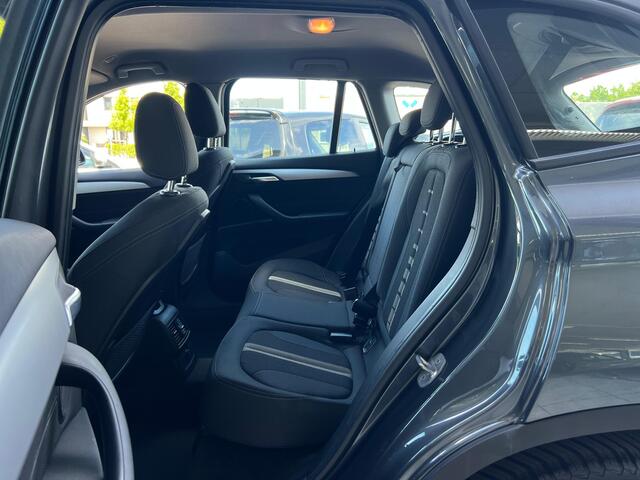 BMW X1 sDrive18i Centennial High Executive NL AUTO | CAMERA | STOELVERW | NAVI | TREKHAAK |