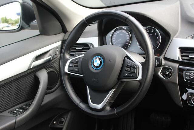 BMW X1 xDrive25e Executive | Incl. 12 maanden garantie | Cruise control | Voorstoelen verwarmd | Climate control | Parkeersensoren voor/achter | DAB | Lichtmetalen velgen | Airco | Bluetooth | Navigatie | Achteruitrijcamera