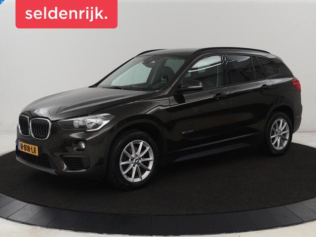 BMW X1 sDrive18d | Leder | Stoelverwarming | Trekhaak | Camera | Navigatie | Climate control | Cruise control | Bluetooth