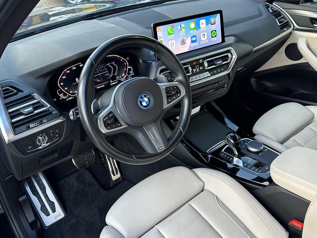 BMW X3 xDrive30e High Executive M-sport | Trekhaak | Surround view | Hifi
