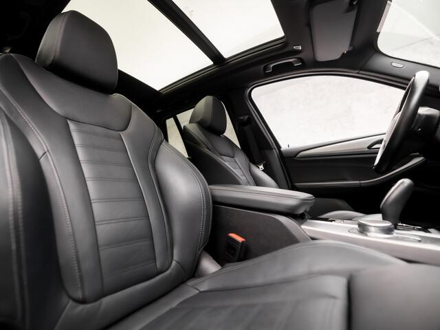 BMW X3 xDrive20i High Executive 184Pk Automaat (PANORAMADAK, HEAD-UP DISPLAY, GROOT NAVI, STUUR/STOELVERWARMING, ELEK SPORTSTOELEN, LEDER, ZWART HEMEL, GETINT GLAS, SFEERVERLICHTING, NIEUWSTAAT)