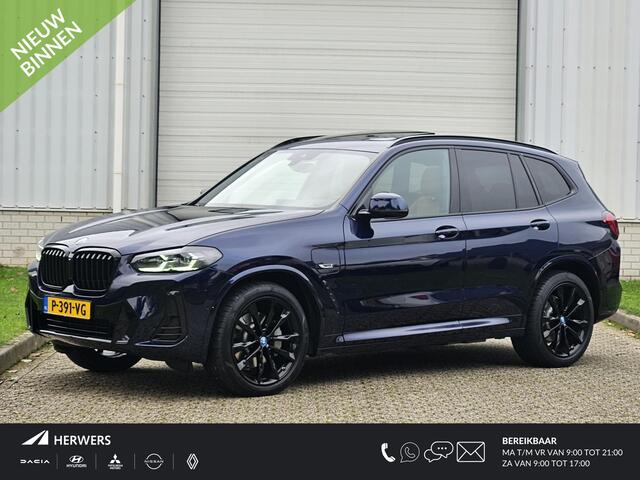 BMW X3 xDrive30e High Executive / Schuif- en Kantel Dak / Lederen Bekleding / Elektrisch Verstelbare Stoelen met Geheugen / Stoelverwarming / Apple Carplay & Android Auto (draadloos) / Elektrische Achterklep / Achteruitrijcamera /