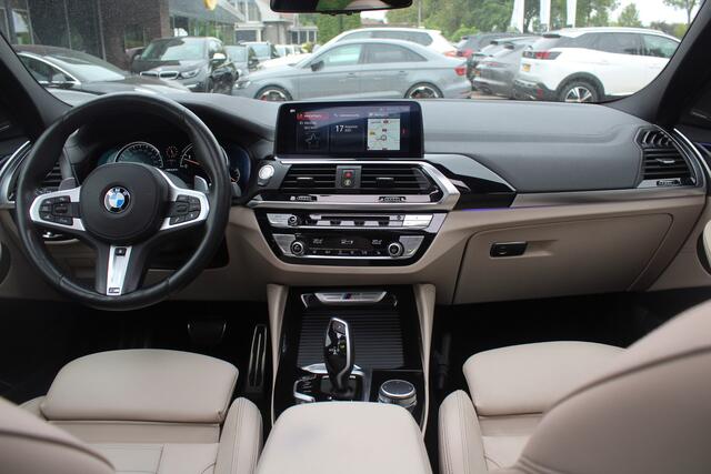 BMW X4 M40i High Executive / Trekhaak / Panoramadak / Camera / Head-up / Luxe Leder / 21'' / Harman Kardon / Navigatie / Stuur+Stoelverwarming / DAB / Dodehoek / Cruise Control