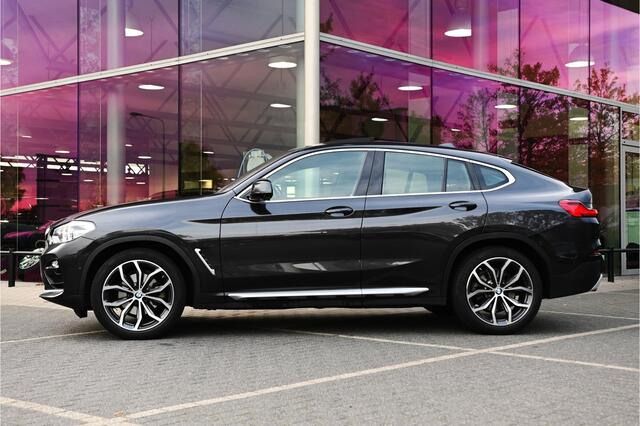 BMW X4 xDrive20i High Executive xLine Automaat / Trekhaak / Panoramadak / Sportstoelen / M Sportonderstel / LED / Parking Assistant Plus / Stoelverwarming / Navigatiesysteem Professional
