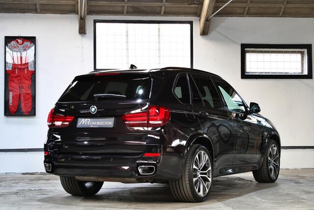 BMW X5 xDrive35i High Executive | Rubinschwarz | M-Sport | Trekhaak | B&O | Panoramadak | NL auto | BMW onderhouden |