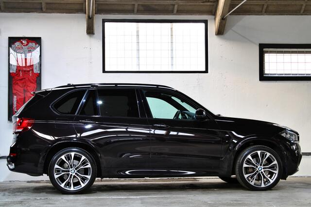 BMW X5 xDrive35i High Executive | Rubinschwarz | M-Sport | Trekhaak | B&O | Panoramadak | NL auto | BMW onderhouden |