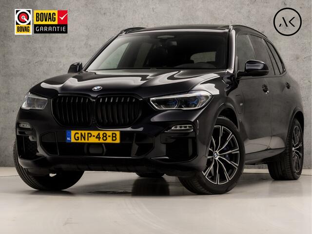 BMW X5 xDrive45e M Sport High Executive 395Pk Automaat (PANORAMADAK, APPLE CARPLAY, LUCHTVERING, HEAD-UP DISPLAY, HARMAN/KARDON, LASER KOPLAMPEN, COMFORTSTOELEN, LIVE COCKPIT PRO, ADAPTIVE CRUISE, NIEUWSTAAT)