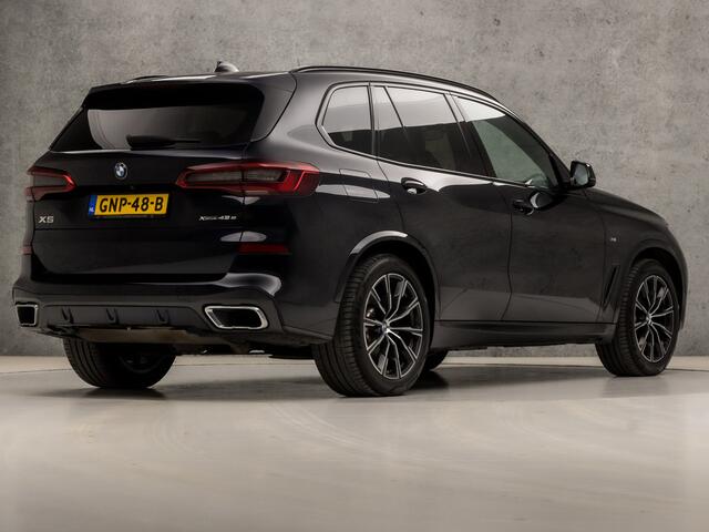 BMW X5 xDrive45e M Sport High Executive 395Pk Automaat (PANORAMADAK, APPLE CARPLAY, LUCHTVERING, HEAD-UP DISPLAY, HARMAN/KARDON, LASER KOPLAMPEN, COMFORTSTOELEN, LIVE COCKPIT PRO, ADAPTIVE CRUISE, NIEUWSTAAT)