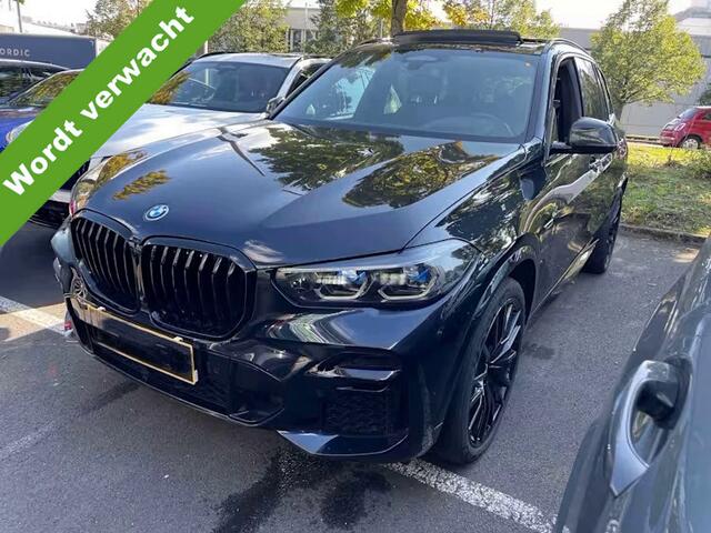 BMW X5 xDrive45e High Executive M-Sport Panoramadak Head-Up Display 22 Inch Laser Licht Trekhaak 4WD Besturing Buitenspiegels M Carbon Keyless Entry