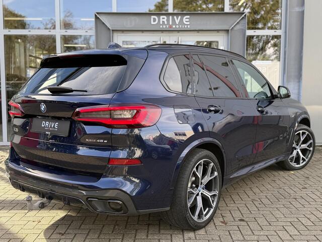 BMW X5 xDrive45e High Ex. M-Sport|Individual|SOH93%|Pano|Laser|CoPilot|21"|HUD|HIFI|Trekhaak|Tansanit