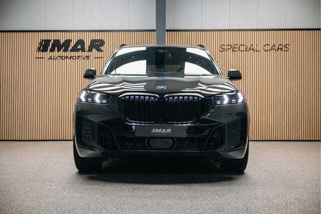 BMW X5 xDrive50e | Luxe stoelen | Luchtvering | Dravit Grau | Trekhaak | Stuur en stoelverwarming | Harman/Kardon |