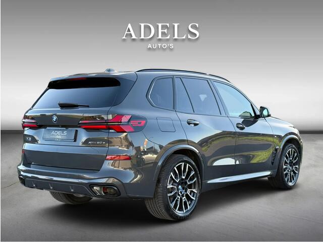 BMW X5 xDrive50e M Sport Pro Dravitgrau Panodak Harman Kardon Carbon Trekhaak Dealer Onderhouden