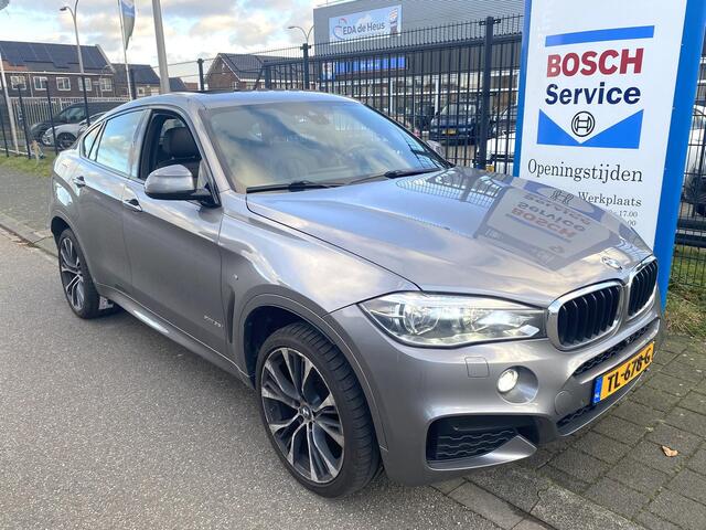 BMW X6 xDrive35i High Executive M Sport met o.a. Harman/Kardon, dak, LED, luchtvering, 21", trekhaak, etc.