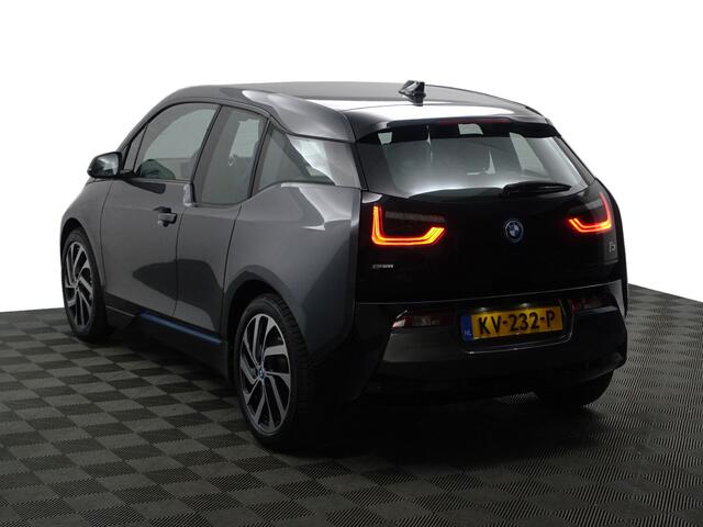 BMW i3 High Voltage Edition 94Ah 33 kWh- Xenon Led, Park Assist, Stoelverwarming, Navigatie, Cruise, Privacy Glass