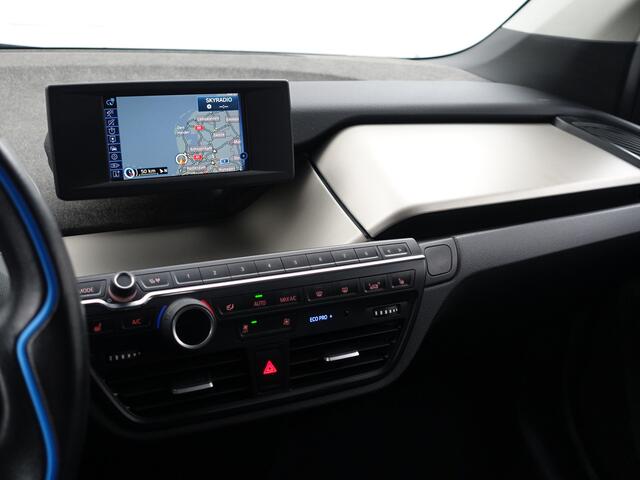 BMW i3 High Voltage Edition 94Ah 33 kWh- Xenon Led, Park Assist, Stoelverwarming, Navigatie, Cruise, Privacy Glass