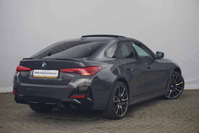 BMW i4 eDrive35 M Sportpakket Pro 20'' / Glazen schuif-/kanteldak / Harman Kardon / Stuurwielrand verwarmd