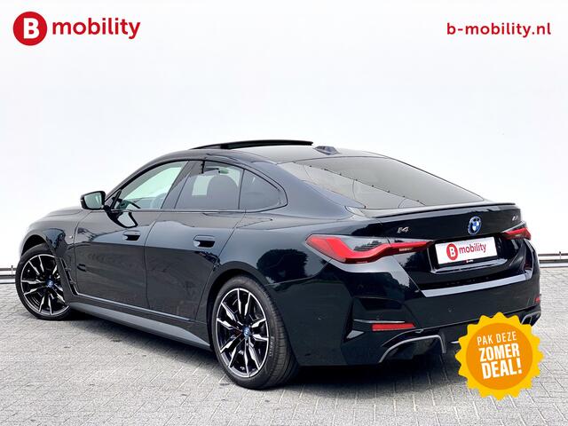 BMW i4 M50 544Pk High Executive 84 kWh Elektrisch verstelbare stoelen | Trekhaak 1600kg | Schuif/Kanteldak | Driving Assistant Professional | Harman Kardon Sound System | Head Up Display | Verwarmbaar stuurwiel | Interieurlijsten Carbon Fibre | Parking Assist.