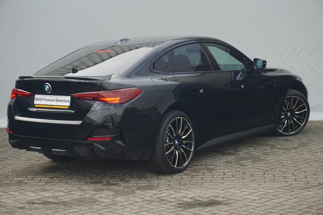 BMW i4 eDrive40 M Sport Pro | Elektrisch schuif-kanteldak / Memory Stoelen / Harman Kardon / Comfort Access / Stoel & Stuurwiel verwarming