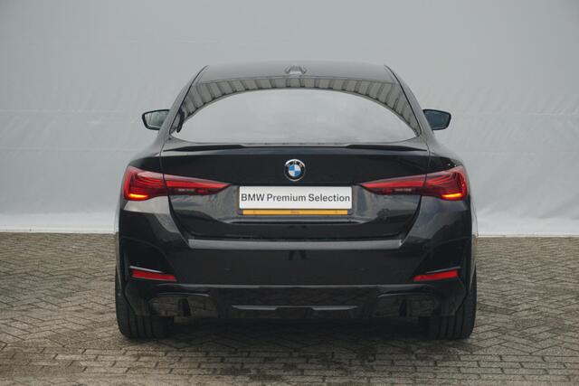 BMW i4 eDrive40 M Sport Pro | Elektrisch schuif-kanteldak / Memory Stoelen / Harman Kardon / Comfort Access / Stoel & Stuurwiel verwarming