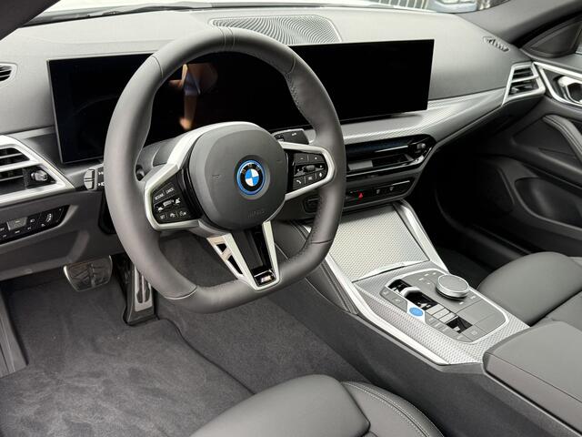 BMW i4 eDrive35 | M-Sport | 19'' | S/k-dak | HiFi | Stuur + stoelverw. | Comf. Acc. | Trekhaak | Camera