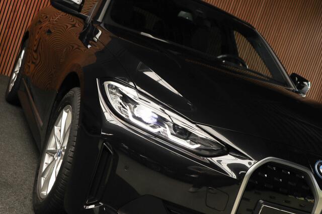 BMW i4 eDrive40 84 kWh M-pakket Navi Leer Elektr. achterklep 360° Camera Co-pilot Climate voor & achter Zwarte hemelbekleding PDC LM velgen BTW auto