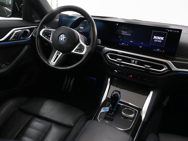 BMW i4 M50 High Executive 84 kWh | SOH 98% | M-Sport | Schuif/Kantel dak | Sportstoelen | Harman/Kardon | x-Drive | Widescreen | Adaptief Onderstel | DAB | Stoelen/stuur verwarmbaar | Trekhaak | Laserlicht |