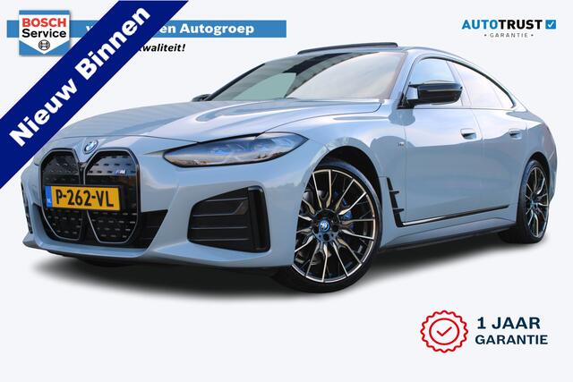 BMW i4 M50 High Executive 84 kWh | Incl. 12 maanden garantie | Assisted driving | Stoel/stuurverwarming | Stoelventilatie | Uitklapbare trekhaak | Head-up display | Memory seat | Schuif/kantel dak | Harman/Kardon | 360° camera |