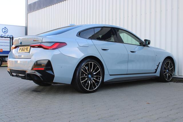 BMW i4 M50 High Executive 84 kWh | Incl. 12 maanden garantie | Assisted driving | Stoel/stuurverwarming | Stoelventilatie | Uitklapbare trekhaak | Head-up display | Memory seat | Schuif/kantel dak | Harman/Kardon | 360° camera |