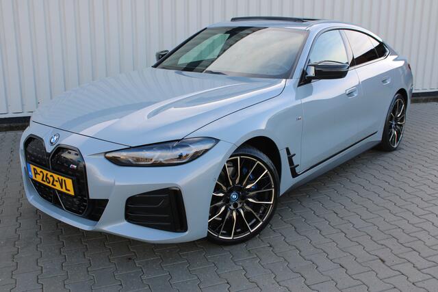 BMW i4 M50 High Executive 84 kWh | Incl. 12 maanden garantie | Assisted driving | Stoel/stuurverwarming | Stoelventilatie | Uitklapbare trekhaak | Head-up display | Memory seat | Schuif/kantel dak | Harman/Kardon | 360° camera |