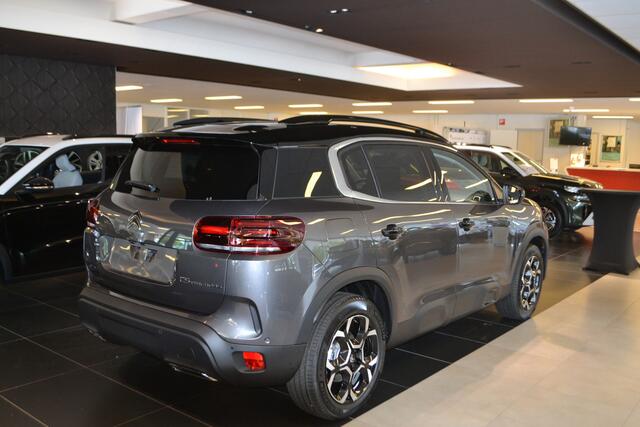 Citroen C5 Aircross 1.6 Plug-in Hybrid 225pk Max I PANORAMADAK I NAVIGATIE I ACHTERUITRIJCAMERA I PARKEERSENSOREN VOOR & ACHTER I ZWARTE ALCANTRA - LEDERENBEKLEDING I EL. ACHTERKLEP I L.M. VELGEN I ACTIE RIJKLAAR ¤ 39.950,- I KLEUR PLATINUM GREY I 3 KM I