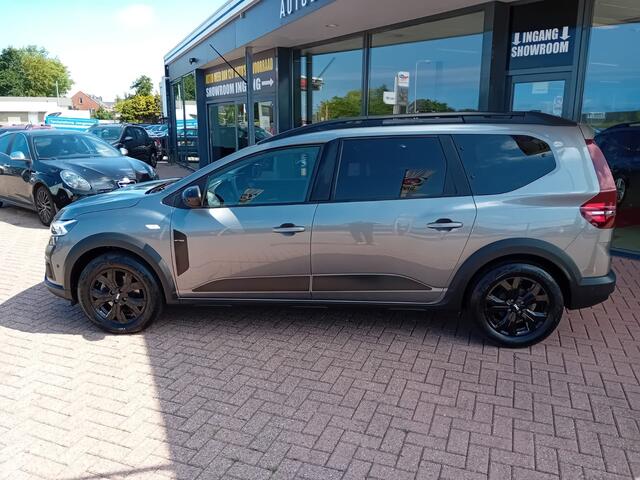 Dacia Jogger 1.6 Hybrid 140 Extreme 7p. Automaat, Airco(automatisch), Carplay/Android auto, Navigatie, Parkeersensoren, Camera, Cruise control, Stoelverwarming, Dode hoek detector, Elektrische ramen en spiegels, Keyless, Regensensor, Dimlicht automatisch, 1e eigenaar,