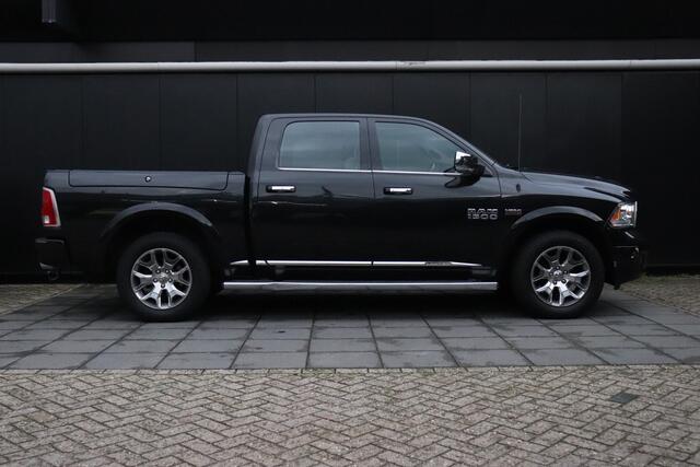 Dodge 1500 Ram 5.7 V8 Quad Cab 6'4 LAGE BIJTELLING !!! | LIMITED| LEDER | SCHUIFDAK | TREKHAAK | MEMORY | STOEL/STUURVERW. | ALPINE | STOELVERK. | CRUISE | NAVI | RAM BOX