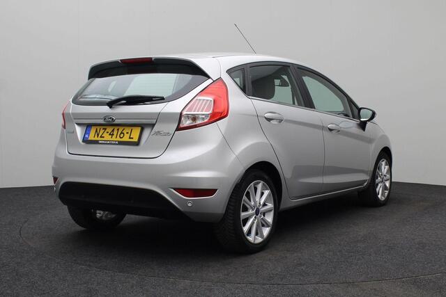 Ford FIESTA 1.0 EcoBoost Titanium 2017 | Airco | Navigatie | Parkeersensoren | Cruise Control | Stuurwiel Bediening | Lichtmetaal | Boekjes | 2 Sleutels | Nationale Autopas