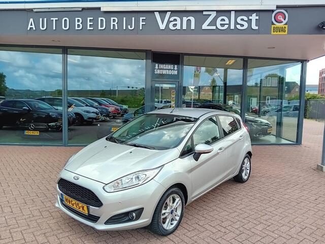 Ford FIESTA 1.0 EcoBoost Titanium, Airco, Multimediasysteem, Bluetooth telefoonverbinding, Cruise control, Parkeersensoren, Navigatie, Stoelverwarming, Verwarmde voorruit, Centrale vergrendeling met AB, Elektrische ramen en spiegels, Lichtmetalen velgen, Nette auto,