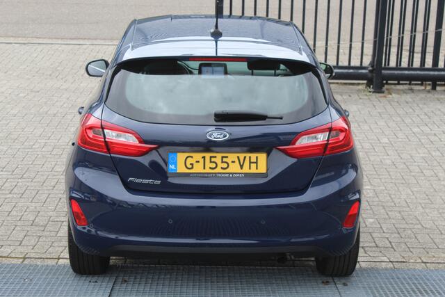 Ford FIESTA 1.0 EcoBoost Titanium Cruise control/Climate control/Lane assist/Apple carplay/Parkeersensoren/DAB+/Elektrisch inklapbare spiegels/16'' Lichtmetalen velgen.