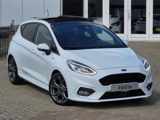 Ford FIESTA 1.0 ST-Line PANORAMADAK|NAVIGATIE|CAMERA|CRUISE CONTROL|STOEL&STUUR VERWARMING|ECC/AIRCO|PDC ACHTER|17 INCH|DEALERE ONDERHOUDEN Maandag tot Vrijdag geopend van 09.00 tot 20.00 uur en Zaterdag van 09.00 tot 18.00 uur