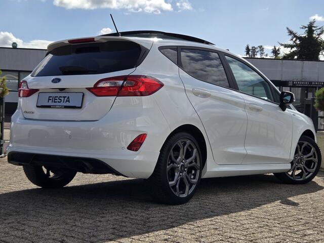 Ford FIESTA 1.0 ST-Line PANORAMADAK|NAVIGATIE|CAMERA|CRUISE CONTROL|STOEL&STUUR VERWARMING|ECC/AIRCO|PDC ACHTER|17 INCH|DEALERE ONDERHOUDEN Maandag tot Vrijdag geopend van 09.00 tot 20.00 uur en Zaterdag van 09.00 tot 18.00 uur