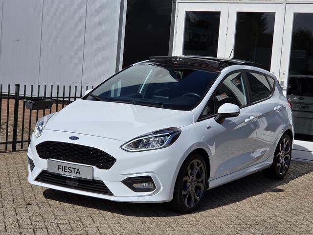 Ford FIESTA 1.0 ST-Line PANORAMADAK|NAVIGATIE|CAMERA|CRUISE CONTROL|STOEL&STUUR VERWARMING|ECC/AIRCO|PDC ACHTER|17 INCH|DEALERE ONDERHOUDEN Maandag tot Vrijdag geopend van 09.00 tot 20.00 uur en Zaterdag van 09.00 tot 18.00 uur