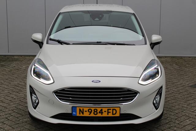 Ford FIESTA 1.0-125pk EcoBoost Mild-Hybrid Titanium. Uniek mooie en luxe Fiesta, slechts 39.000km ! Autm. airco, navigatie, telefoonvoorb., pdc v+a, B&O soundsyst., LM wielen, trekhaak, LED verlichting, adapt. cruise cntrl, side- en lane assist, metallic lak etc.