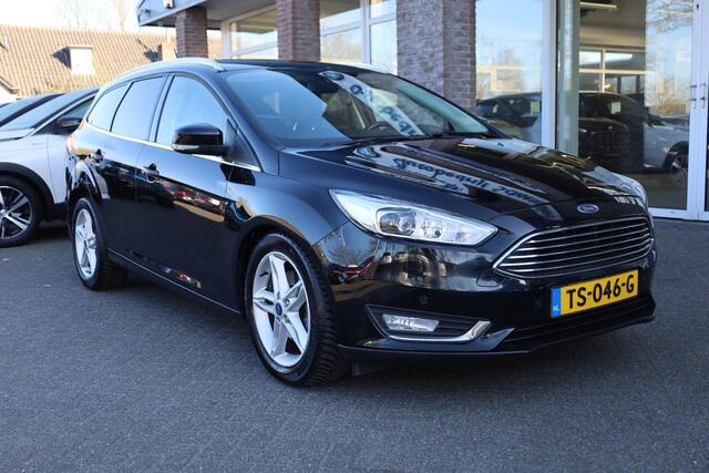 Ford FOCUS Wagon 1.5 Titanium CAMERA TREKHAAK NAVI 17"LMV RUIT/STOEL/STUURVERWARMING HALFLEER 2xPDC NAP
