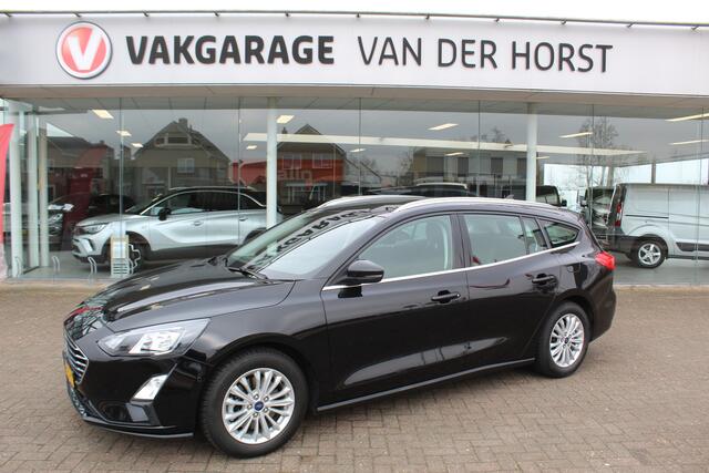 Ford FOCUS Wagon 1.0-125pk EcoBoost Mild-hybrid Titanium. Mooie, ruime, luxe en comfortabele Ford Focus wagon ! Volautm. airco dual, camera, stoel-, stuur- en voorraamverw., easy entry/easy go, cruise control, Isofix, side- en lane assist, parkeersensoren v+a, LM wi