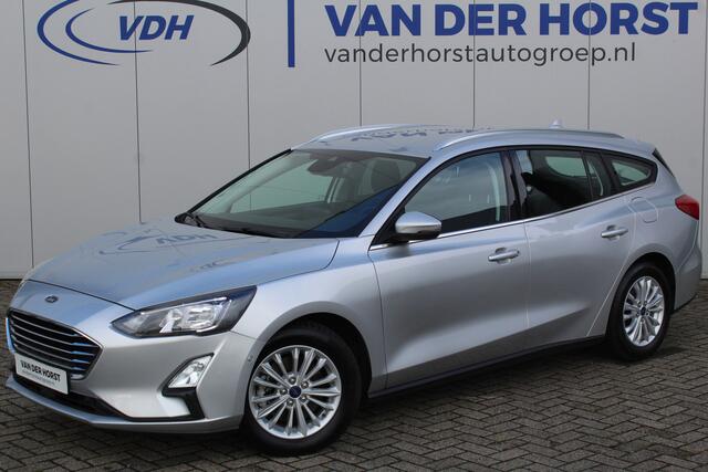 Ford FOCUS Wagon 1.0-125pk EcoBoost Mild-hybrid Titanium. Mooie, ruime, luxe en comfortabele Ford Focus wagon. Volautm. airco dual, camera, easy entry/easy go, stoel-, stuur- en voorraamverw., cruise control, Isofix, side- en lane assist, parkeersensoren v+a, LM wie