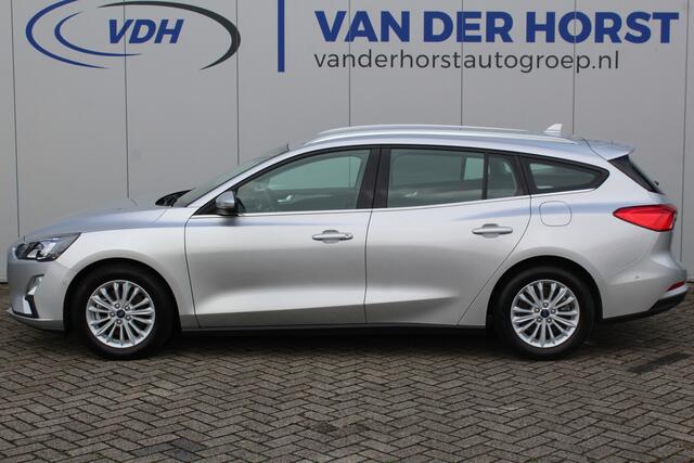 Ford FOCUS Wagon 1.0-125pk EcoBoost Mild-hybrid Titanium. Mooie, ruime, luxe en comfortabele Ford Focus wagon. Volautm. airco dual, camera, easy entry/easy go, stoel-, stuur- en voorraamverw., cruise control, Isofix, side- en lane assist, parkeersensoren v+a, LM wie