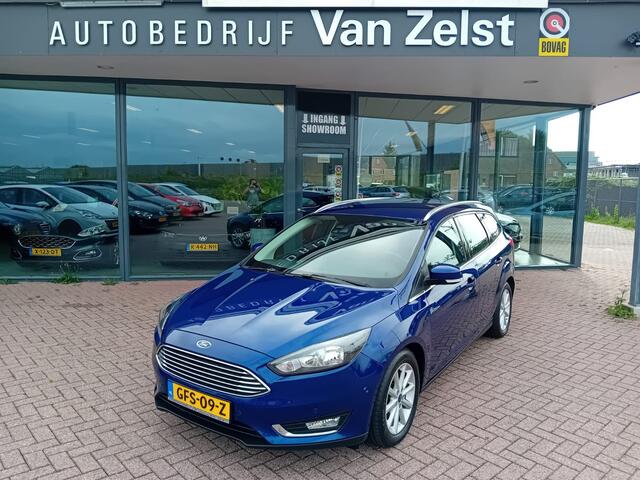 Ford FOCUS Wagon 1.5 Titanium Automaat 150 PK, Airco(automatisch), Multimediasysteem, Carplay/Android auto, Navigatie, Camera, Parkeersensoren, Parkeerhulp, Cruise control, Stoelverwarming, Verwarmd stuurwiel, Verwarmde voorruit, Keyless, Half lederen bekleding, Tre